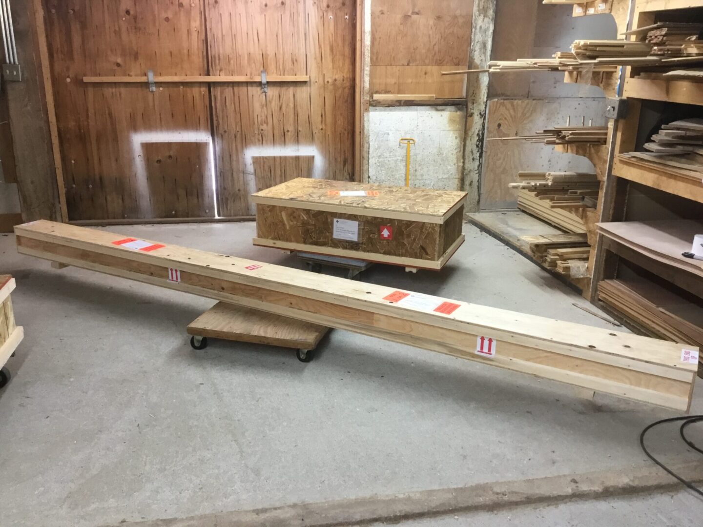 A wooden beam sitting on top of a floor.