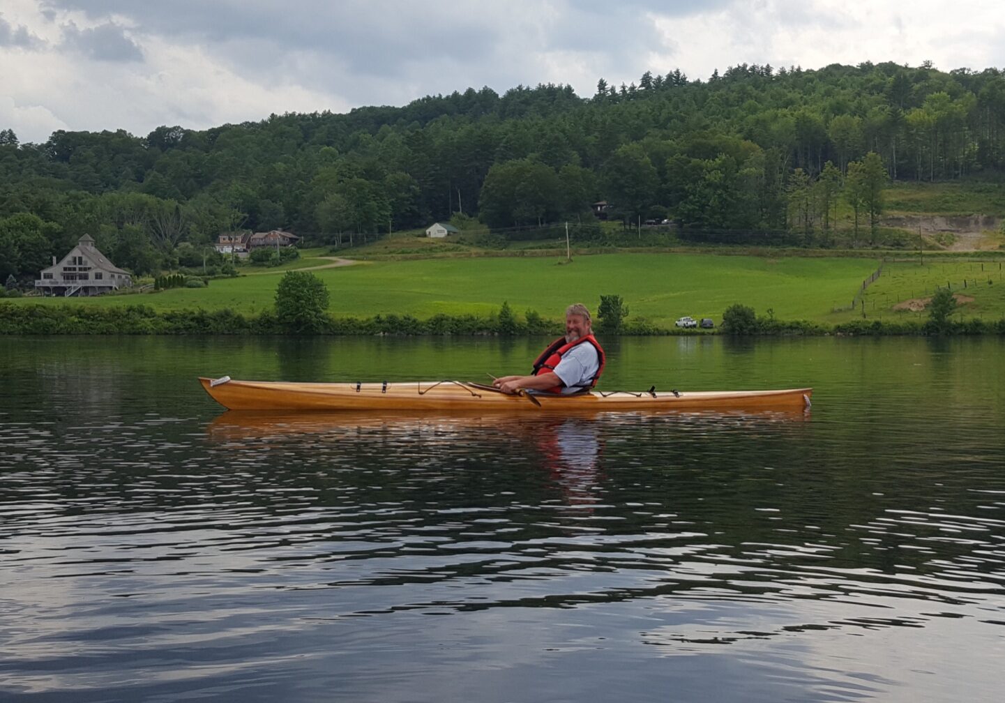 A man in a canoe on the water.